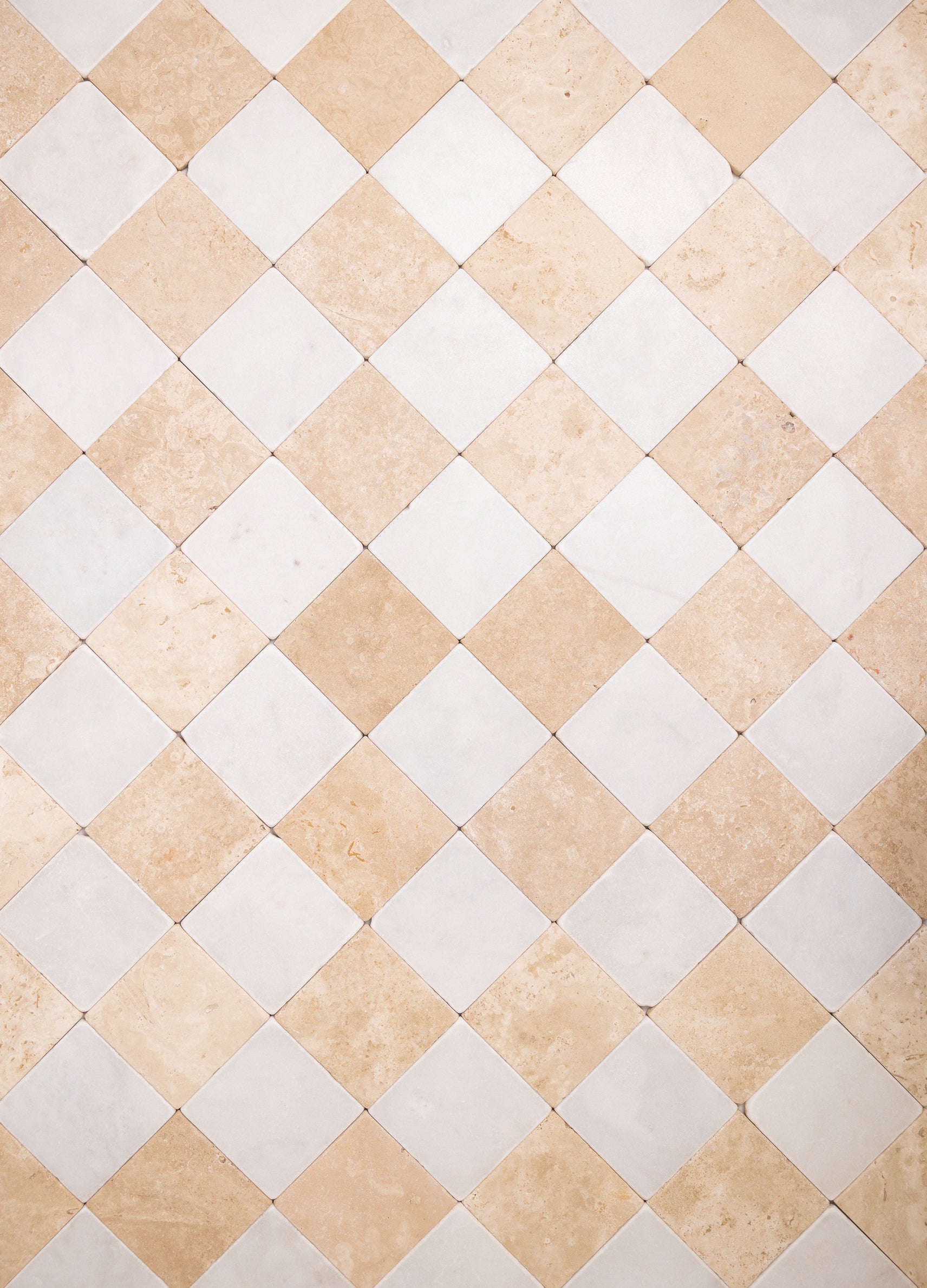 Beige and white tumbled marble checkered tile pattern in 4x4 squares