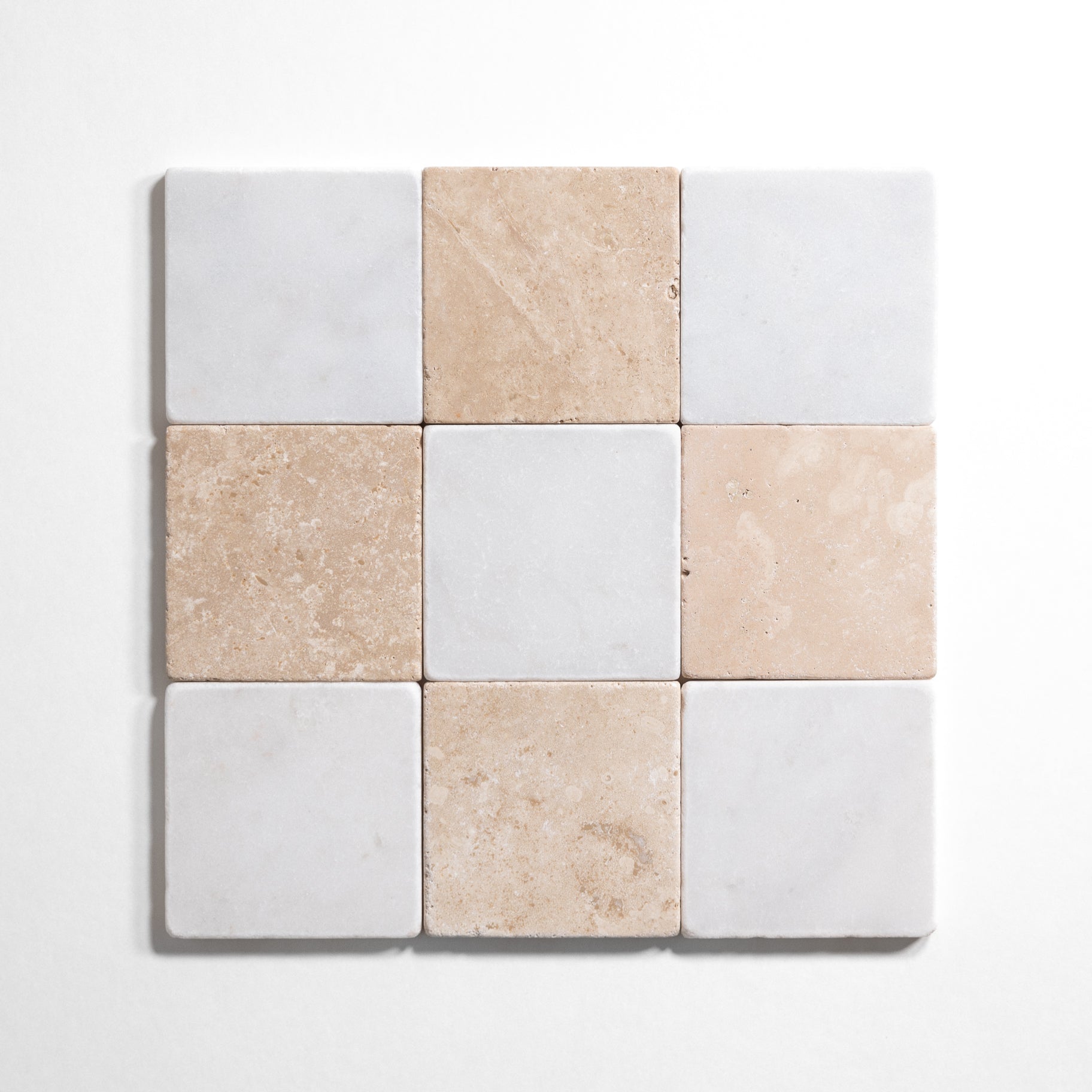 Beige and white tumbled marble checkered tile pattern in 4x4 squares