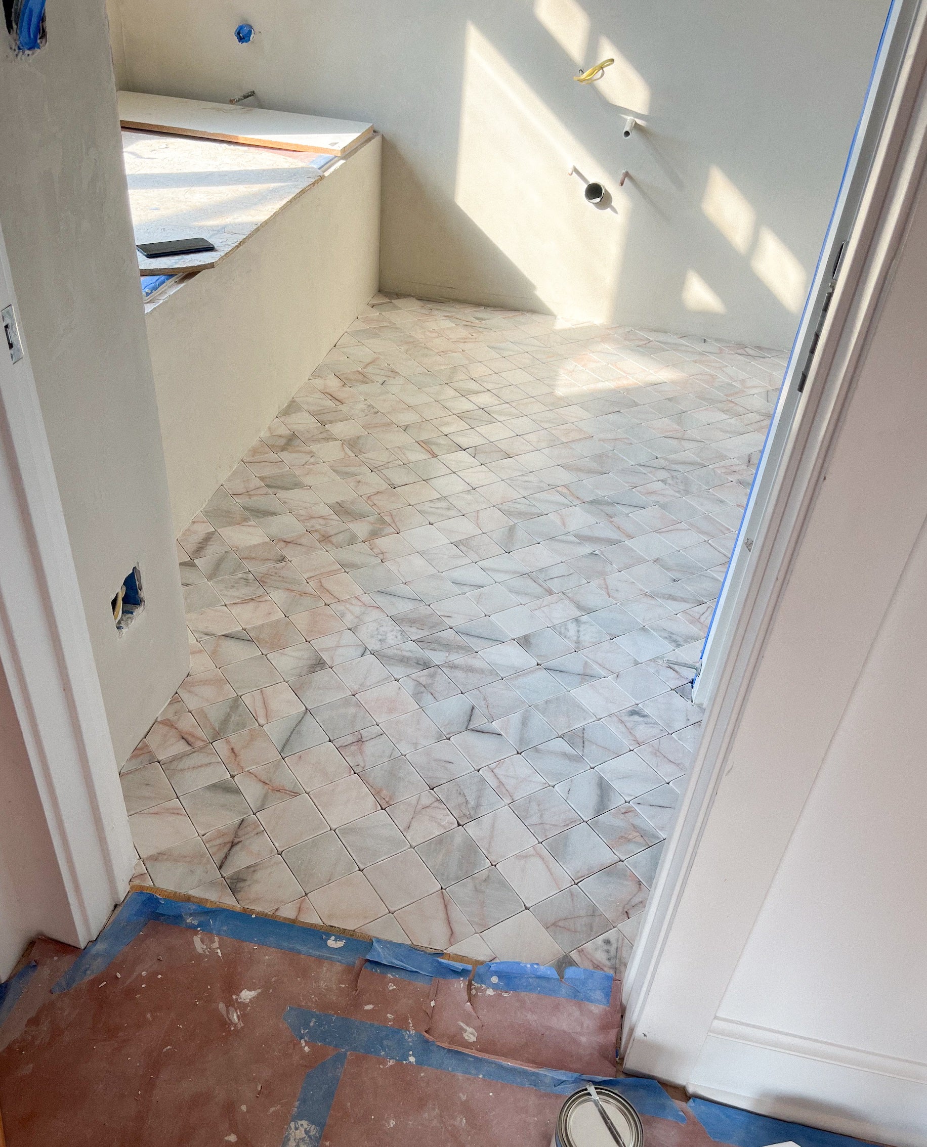 Pink and white tumbled marble