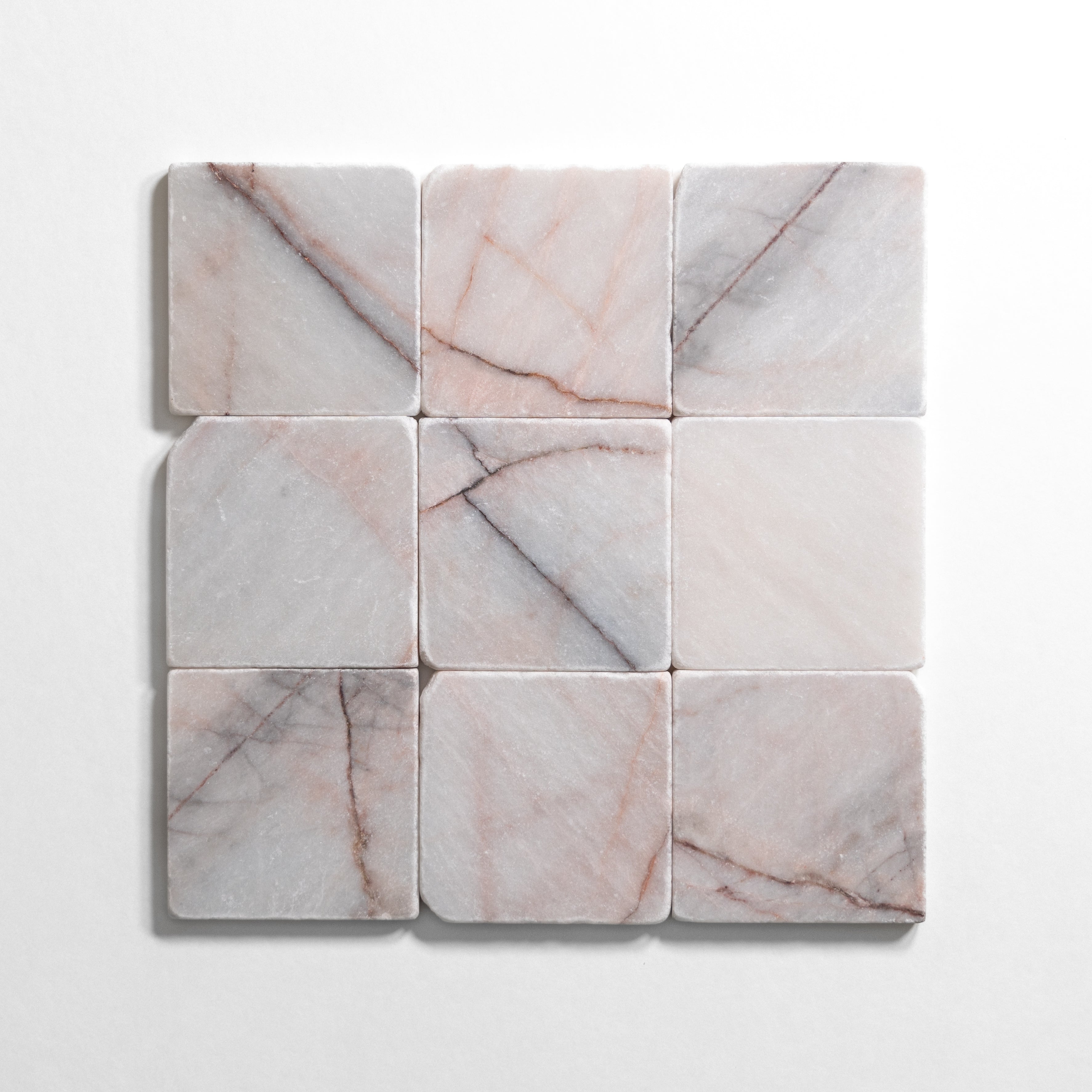 Pink and white tumbled marble