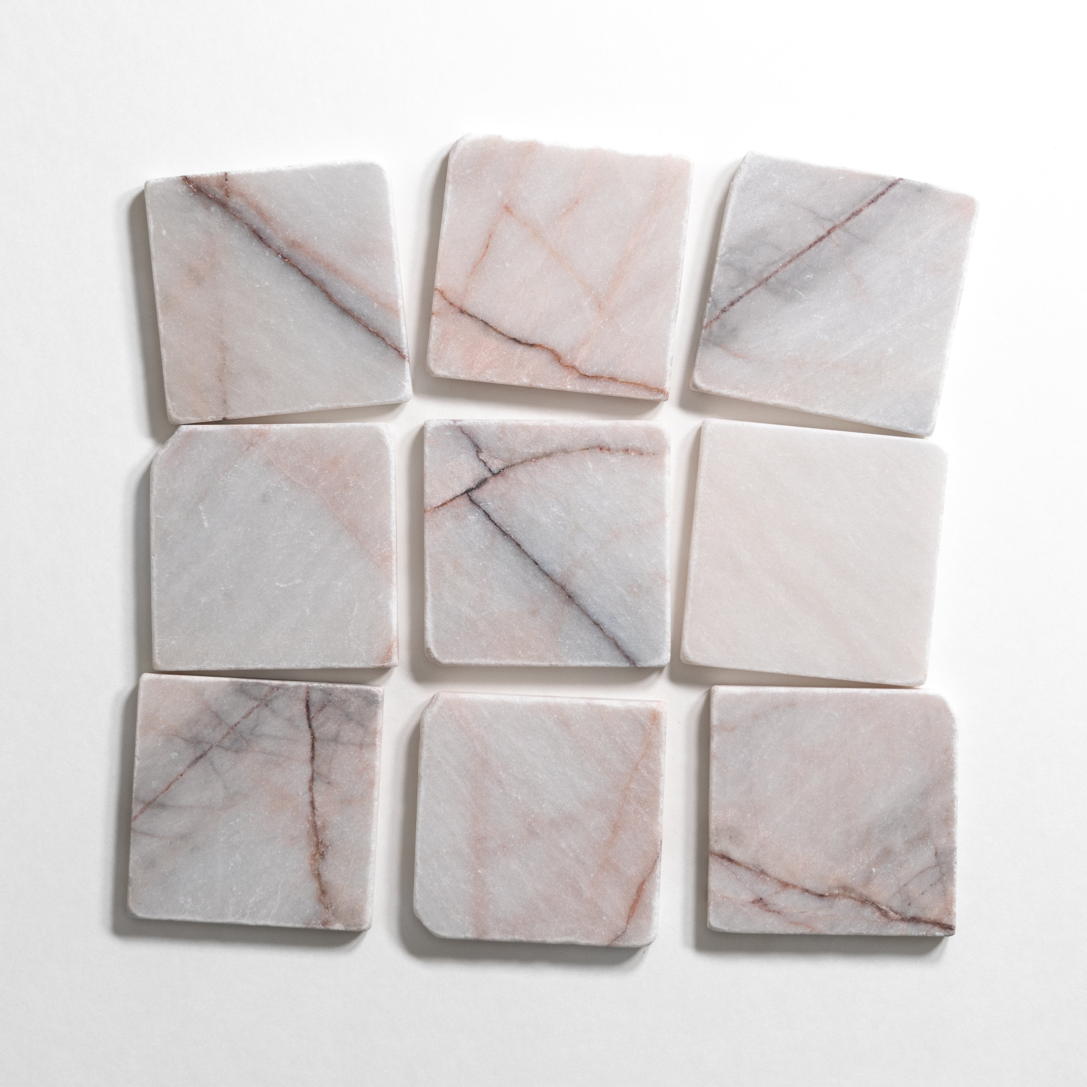 Pink and white tumbled marble