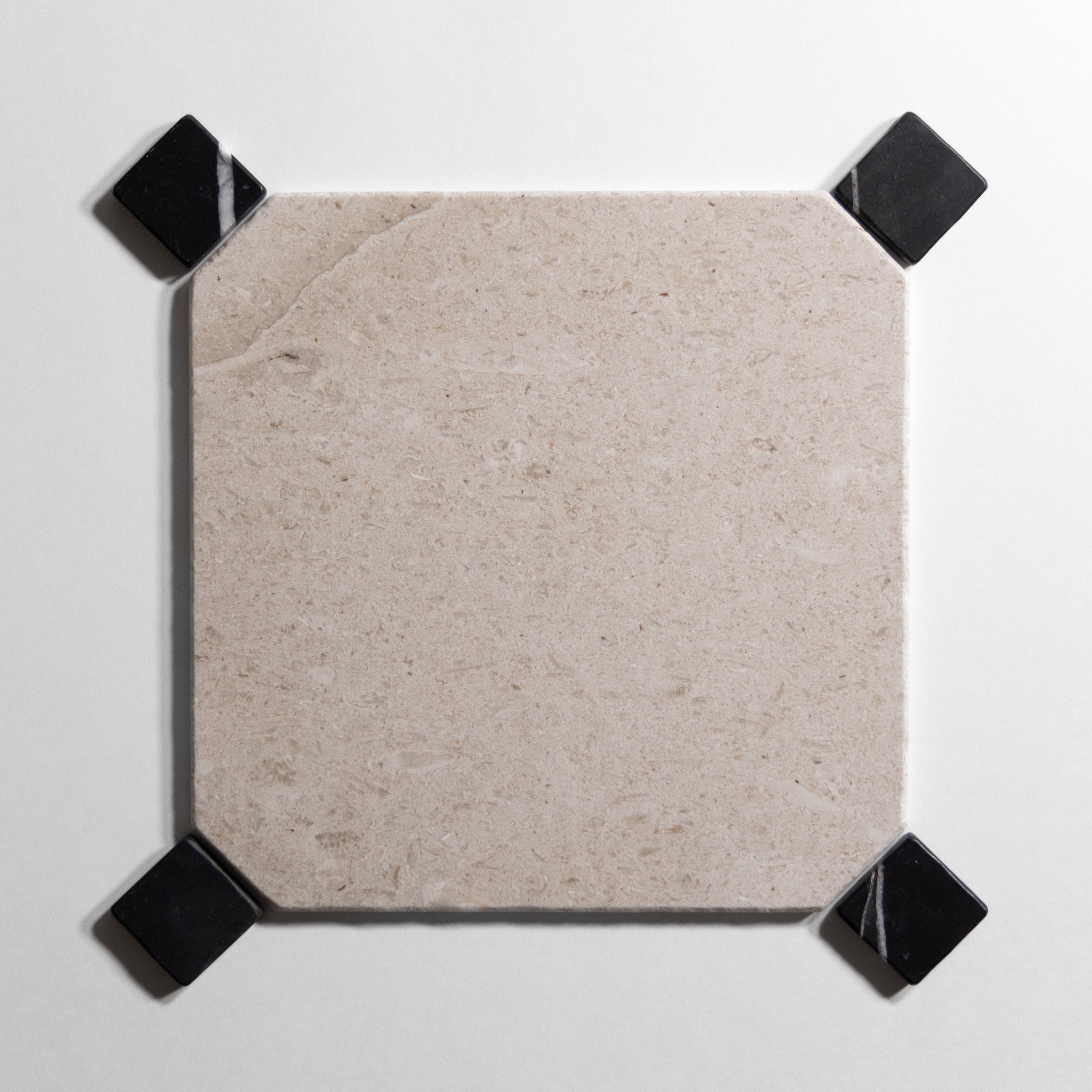 Sierra Limestone Tumbled black and cream mosaic tile