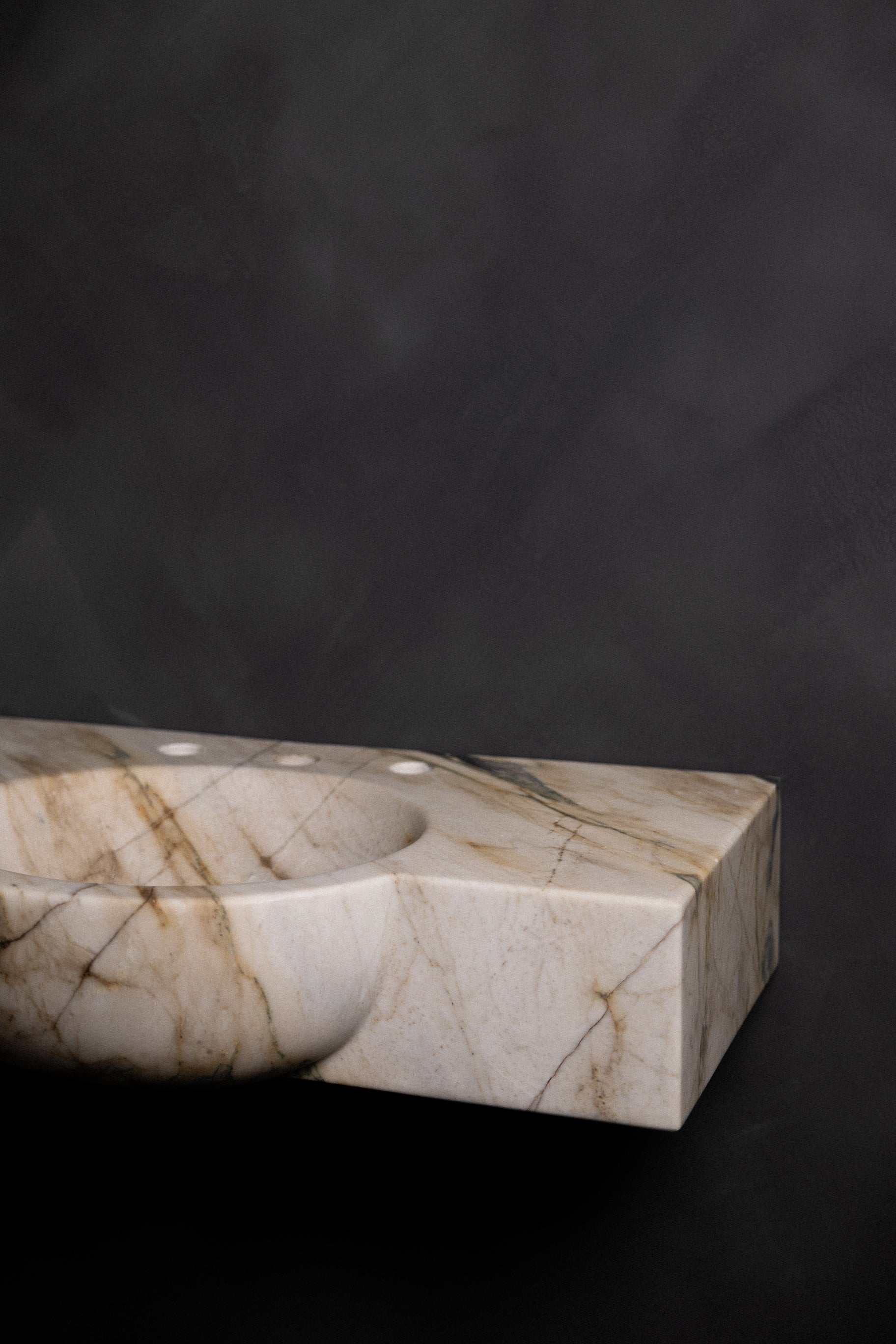 Calacatta Macchia Vecchia floating marble sink