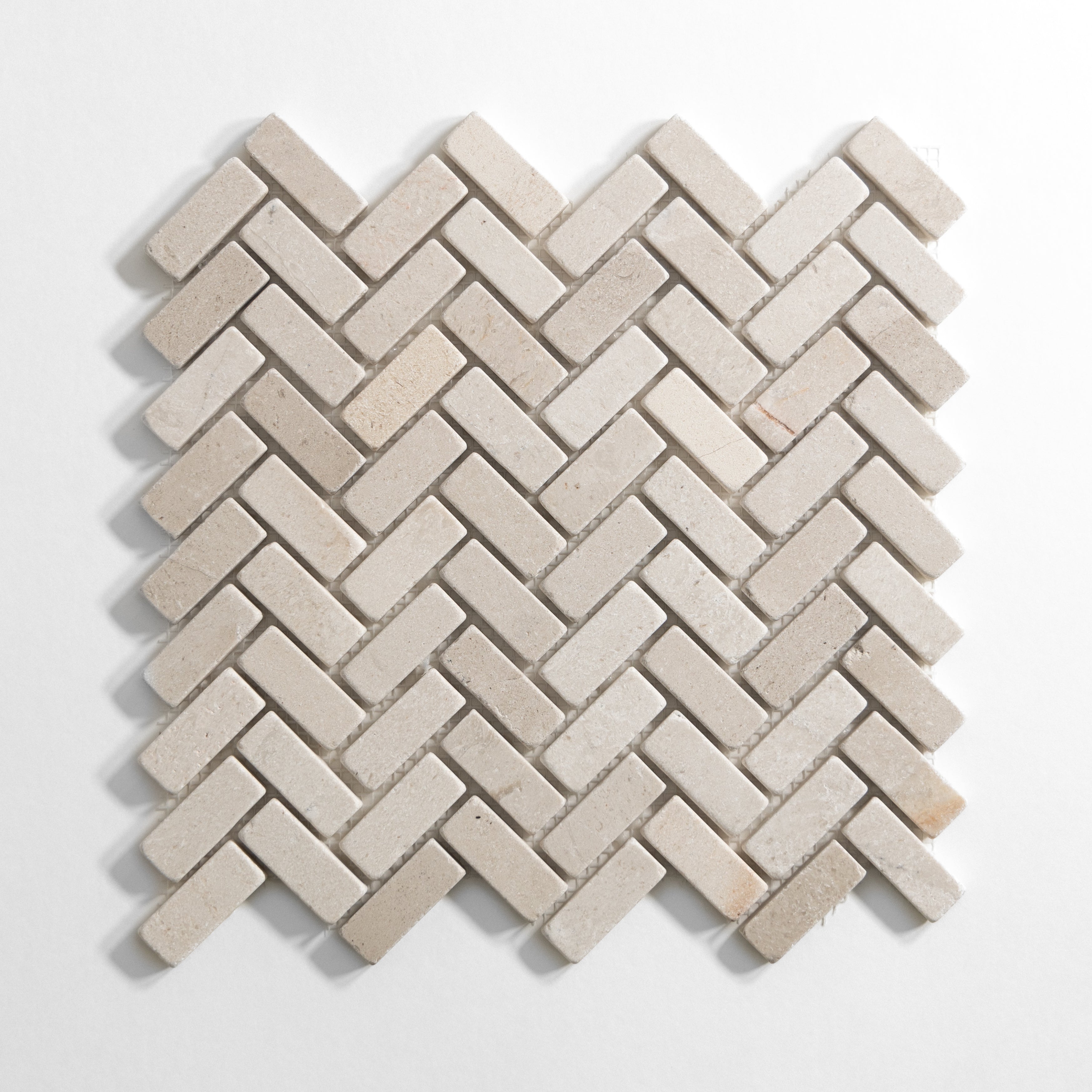 Crema Tumbled Mini Herringbone