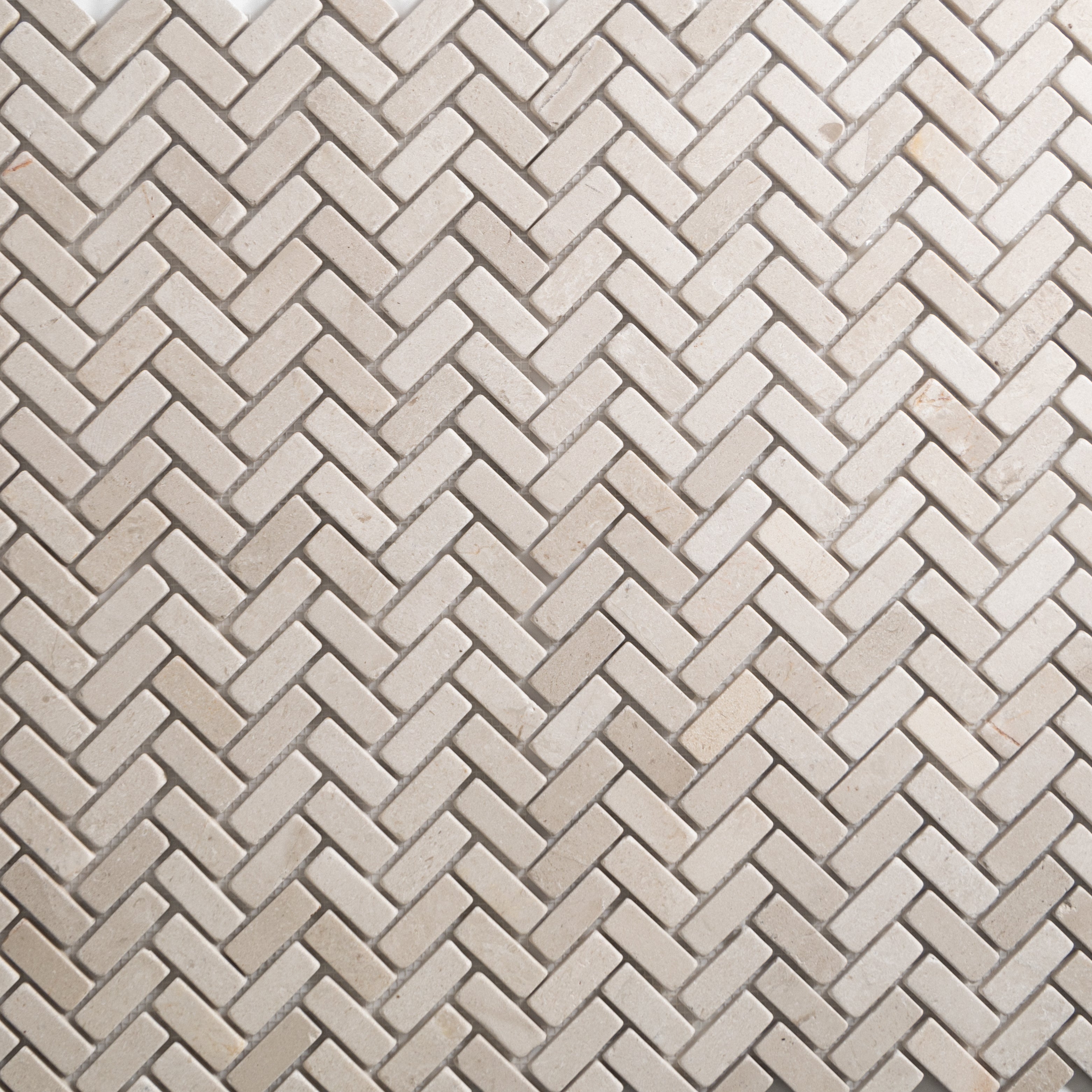 Crema Tumbled Mini Herringbone