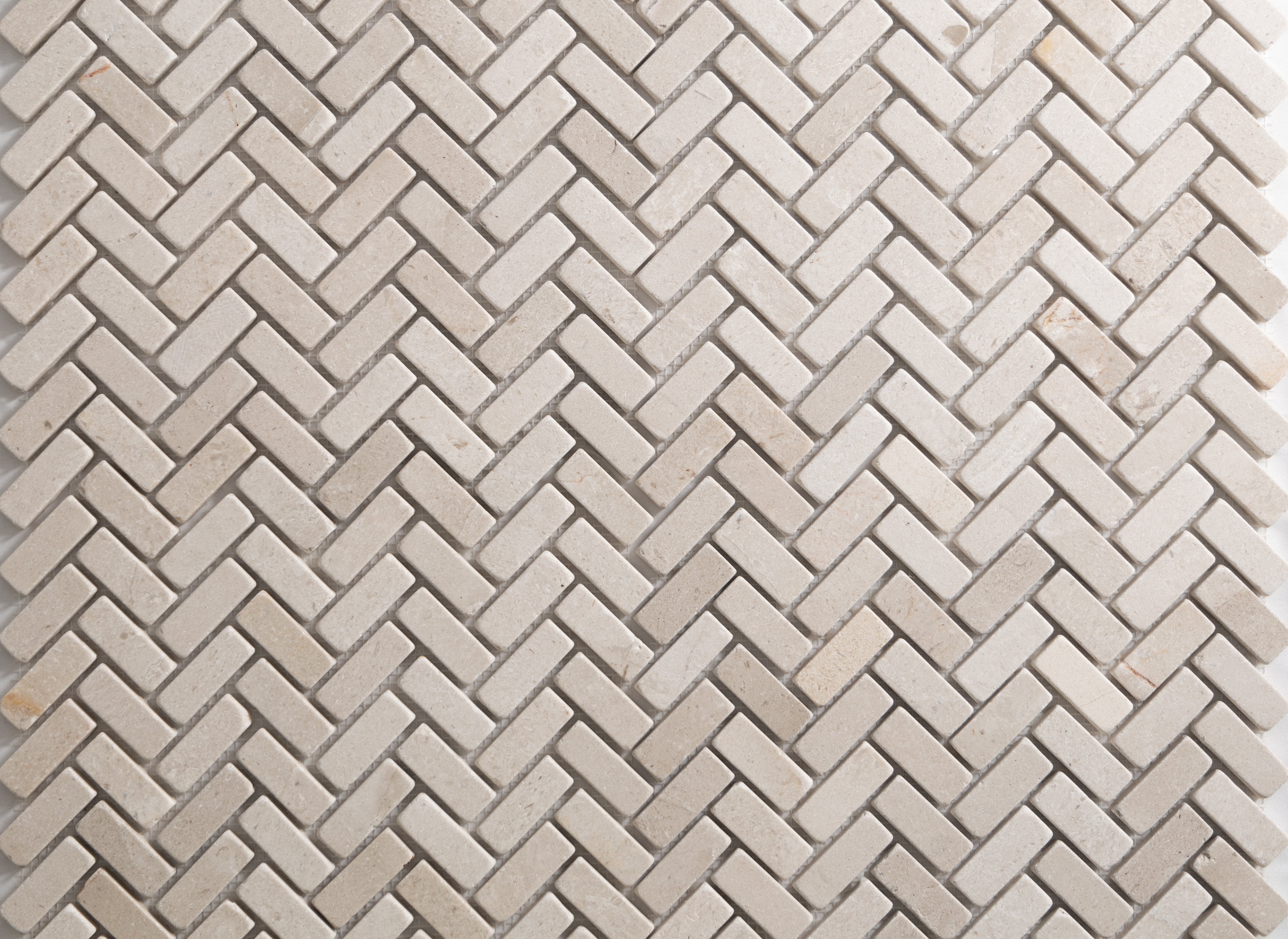 Crema Tumbled Mini Herringbone