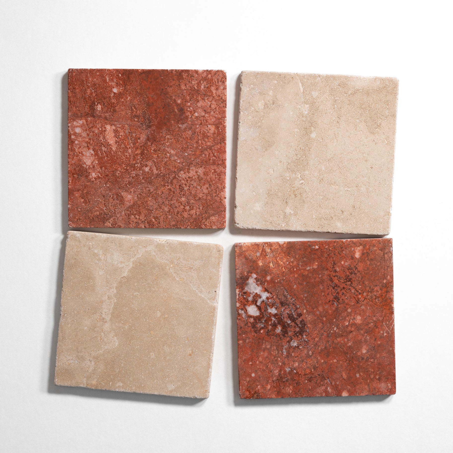 Beige and red tumbled marble checkered tile pattern in 4x4 squares