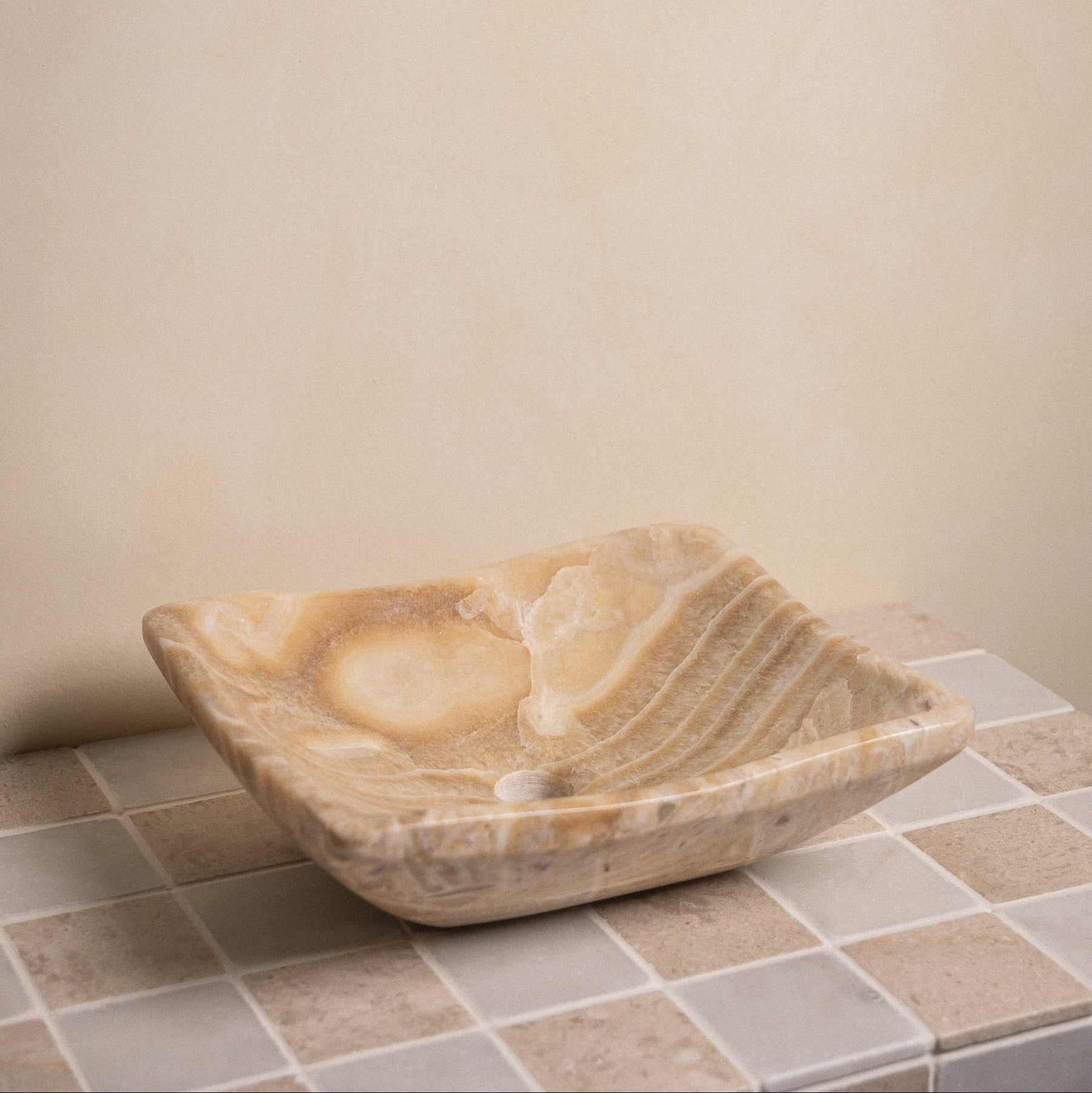 Honey Onyx vessel sink 